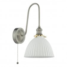 a vintage-inspired wall light in antique chrome finish with white ceramic dome shade with ribbed detail