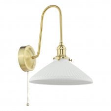 vintage inspired brass wall light with white ceramic shade with ribbed detailing