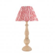 wooden table lamp with pink ikat pattern shade