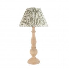 wooden table lamp with green leaf pattern shade
