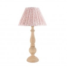 wooden table lamp with peach leaf pattern shade