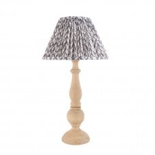 wooden table lamp with grey leaf pattern shade
