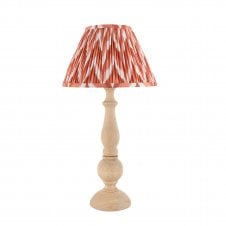 wooden table lamp with orange zigzag pattern shade