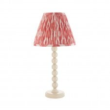 white table lamp with pink ripple pattern tapered shade