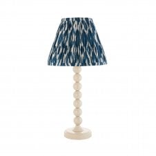 white table lamp with blue ikat pattern tapered shade