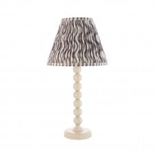 white table lamp with grey ripple pattern tapered shade