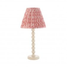 white table lamp with pink ripple pattern tapered shade