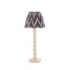 white table lamp with grey zigzag tapered shade