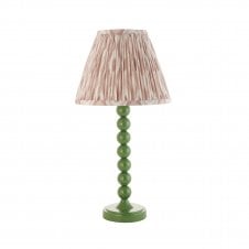 green table lamp with neutral ikat pattern tapered shade