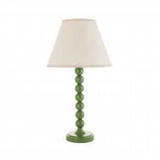 green table lamp with white tapered shade
