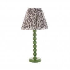 green table lamp with grey leaf pattern tapered shade