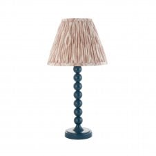 blue table lamp with neutral ikat pattern shade