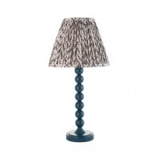 blue table lamp with grey leaf pattern tapered shade