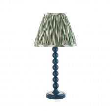 blue table lamp with green zigzag pattern tapered shade