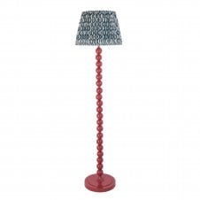 pink floor lamp with blue ripple pattern shade