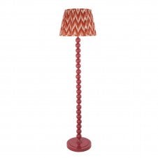 pink floor lamp with orange zigzag pattern shade