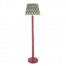 pink floor lamp with green zigzag pattern shade