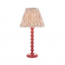 pink table lamp with neutral ikat pattern tapered shade
