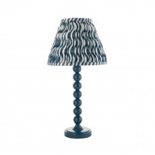 blue table lamp with blue ripple pattern tapered shade