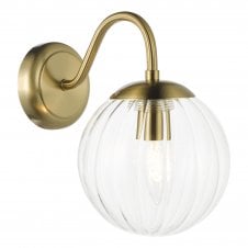 modern antique brass wall light with glass globe shade 
