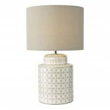 A grey neutral ceramic lam with grey linen shade