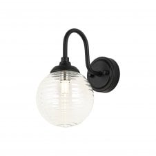 black curved arm wall light with round ribbed glass shad