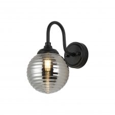 black curved arm wall light with round smoked ribbed glass shade