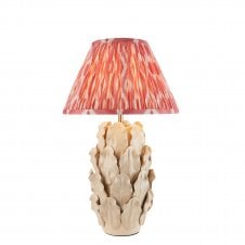 ivory ceramic table lamp with coral pink ikat pattern shade
