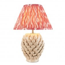 ivory ceramic table lamp with coral pink ikat pattern shade