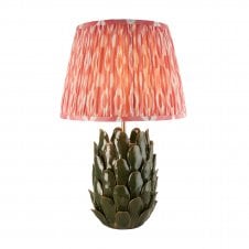 dark green ceramic table lamp with coral pink ikat pattern shade