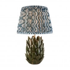 dark green ceramic table lamp with blue ripple pattern shade