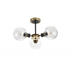 semi-flush 3 light ceiling fixture in brass and black with segmented glass shades