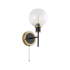 single wall light in brass and black with clear round segmented glass shade