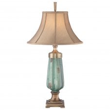 green ceramic table lamp with aged brass accents and tan shade