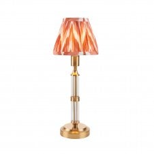 brass rechargeable table lamp with orange zigzag pattern shade