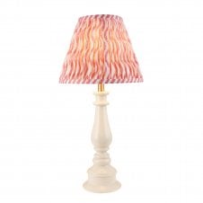 white spindle table lamp with coral ripple pattern shade