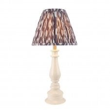 white spindle table lamp with grey ikat pattern shade