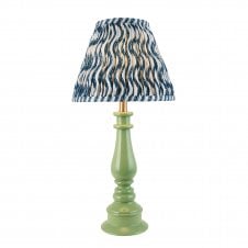 green spindle table lamp with blue ripple pattern shade