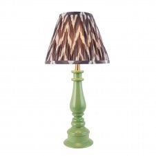 green spindle table lamp with grey zigzag shade