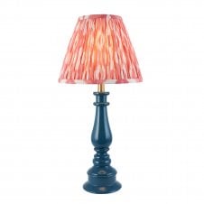 blue spindle table lamp with pink ikat pattern shade
