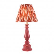pink spindle table lamp with orange zigzag pattern shade