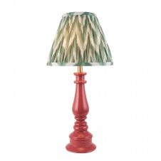 pink spindle table lamp with green zigzag pattern tapered shade