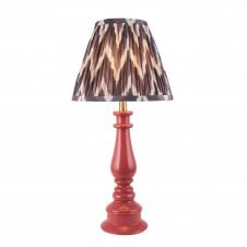 pink spindle table lamp with grey zigzag pattern shade