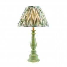green spindle table lamp with green zigzag pattern shade