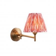 brass wall light with coral ripple shade