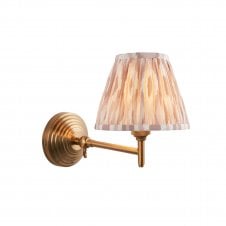 brass wall light with ikat neutral cream shade