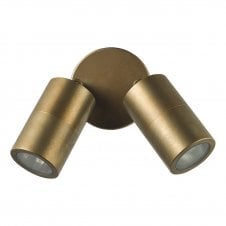 a modern, aged brass outdoor wall light featuring two spotlights 