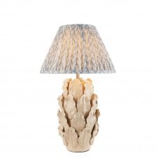 ivory ceramic table lamp with pale blue leaf pattern shade