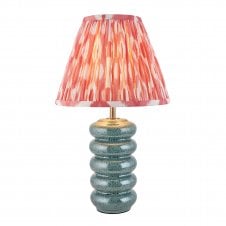 blue ceramic table lamp with coral pink ikat pattern shade