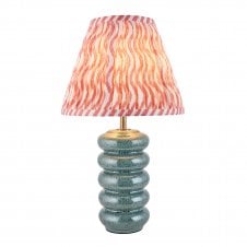 blue ceramic table lamp with coral pink ripple pattern shade